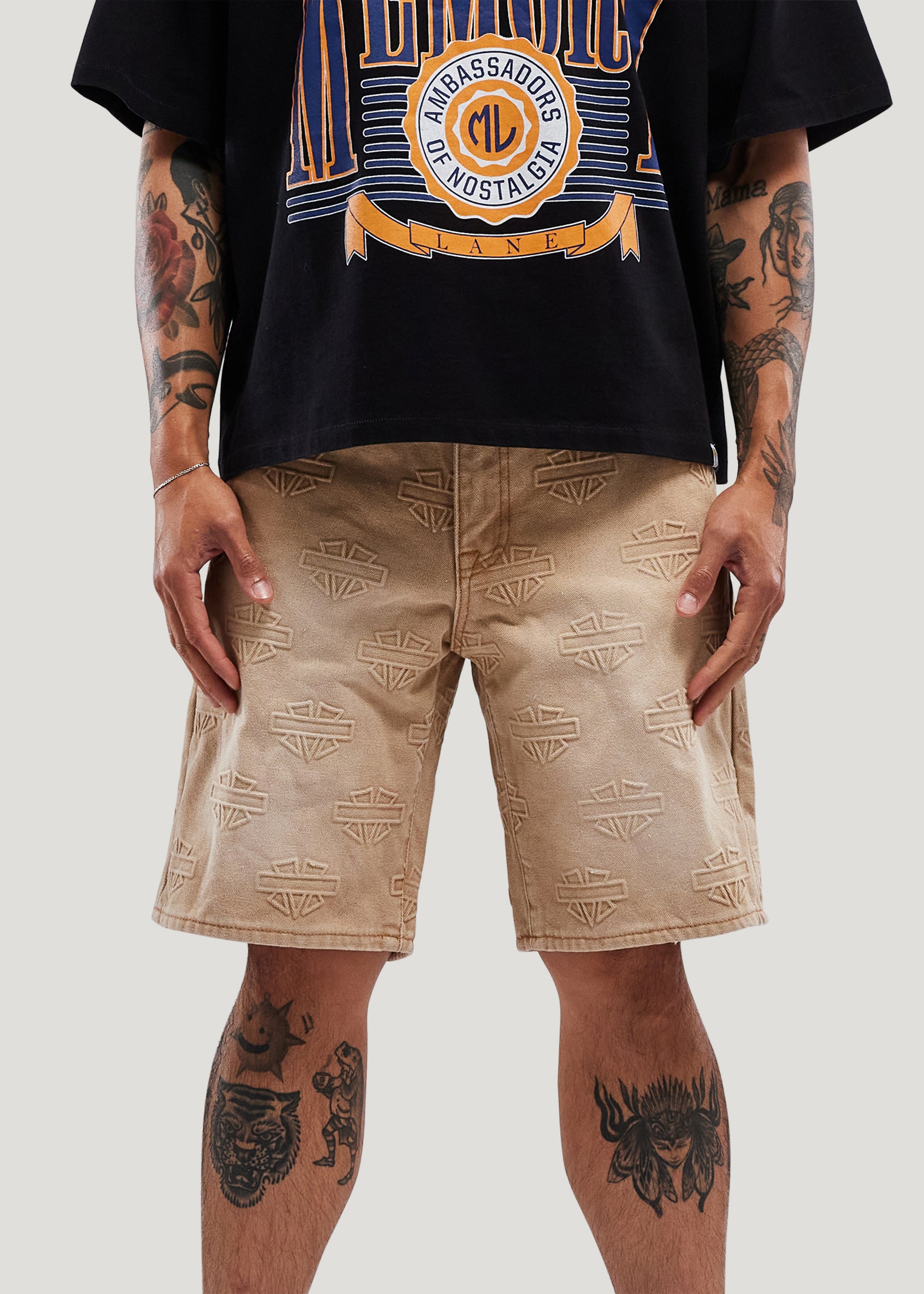 M Shield Debossed Pattern Denim Shorts (Dark Brown)