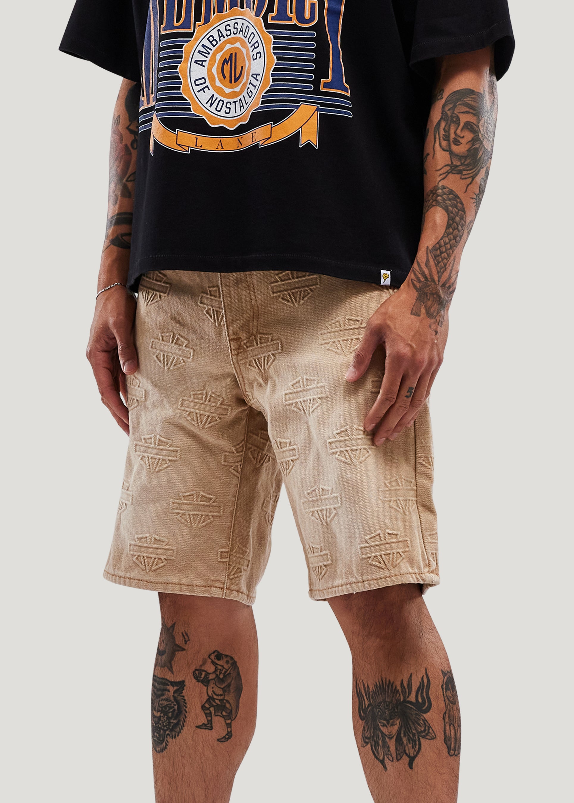 M Shield Debossed Pattern Denim Shorts (Dark Brown)